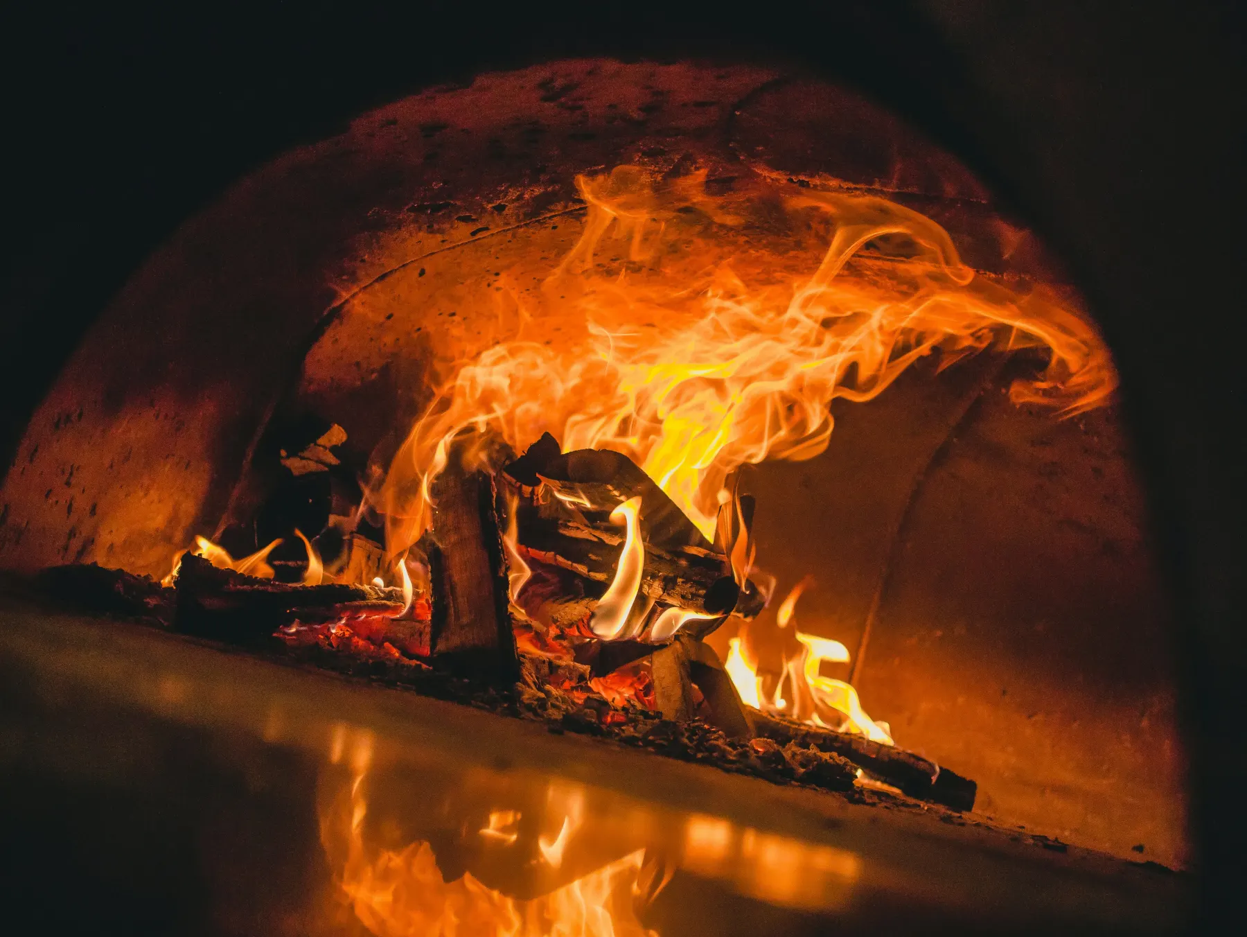 The wood-fired Neapolitan pizza oven at Leo’s Beach Bar