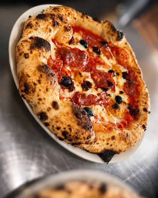 Italian flour, tomatoes and olive oil in the kitchen